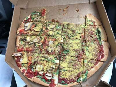nasty-dominoes pizza with nutritional yeast - Tips for vegan road tripping
