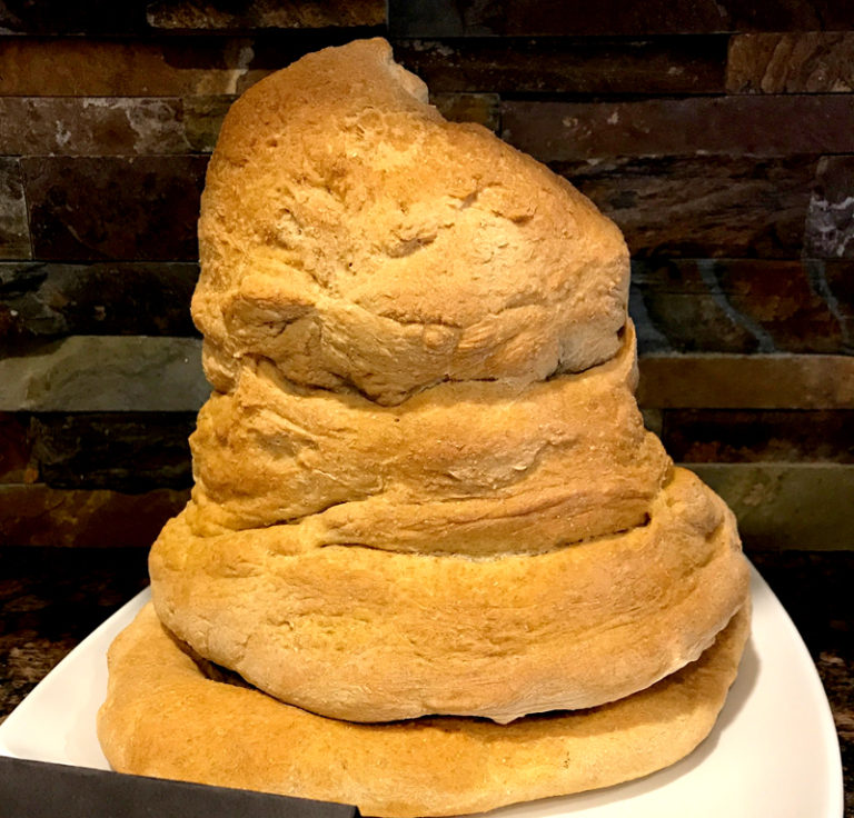 Vegan Harry Potter Sorting Hat Bread. Make your own bread recipe and fashion it into a sorting hat. Edible at party with hummus! Or dip into pumpkin soup.